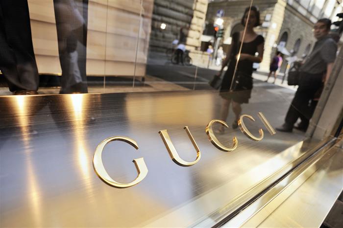 Gucci Gaffe Results in Green for Grads