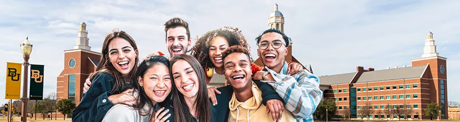 Group of college students smiling and laughing on Baylor Campus