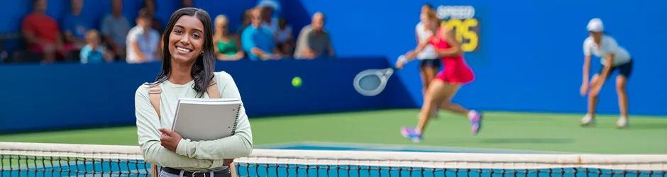 Female college student with tennis court and players in background