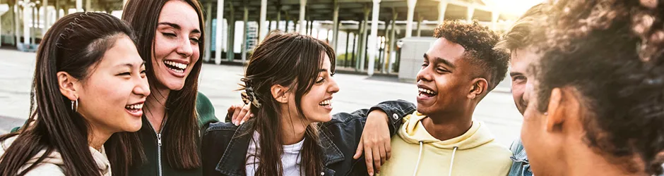 Six college students laughing